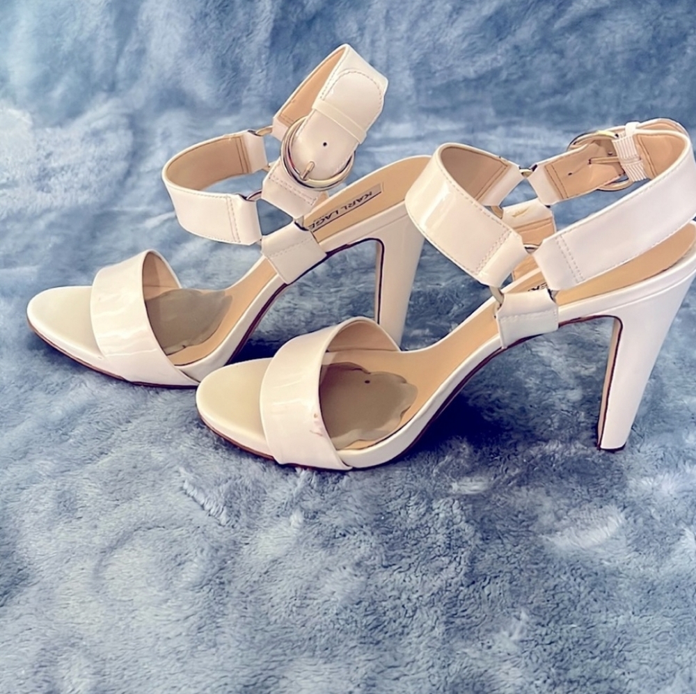White patent leather  Karl Lagerfeld heels  with gold accent.  Size 9